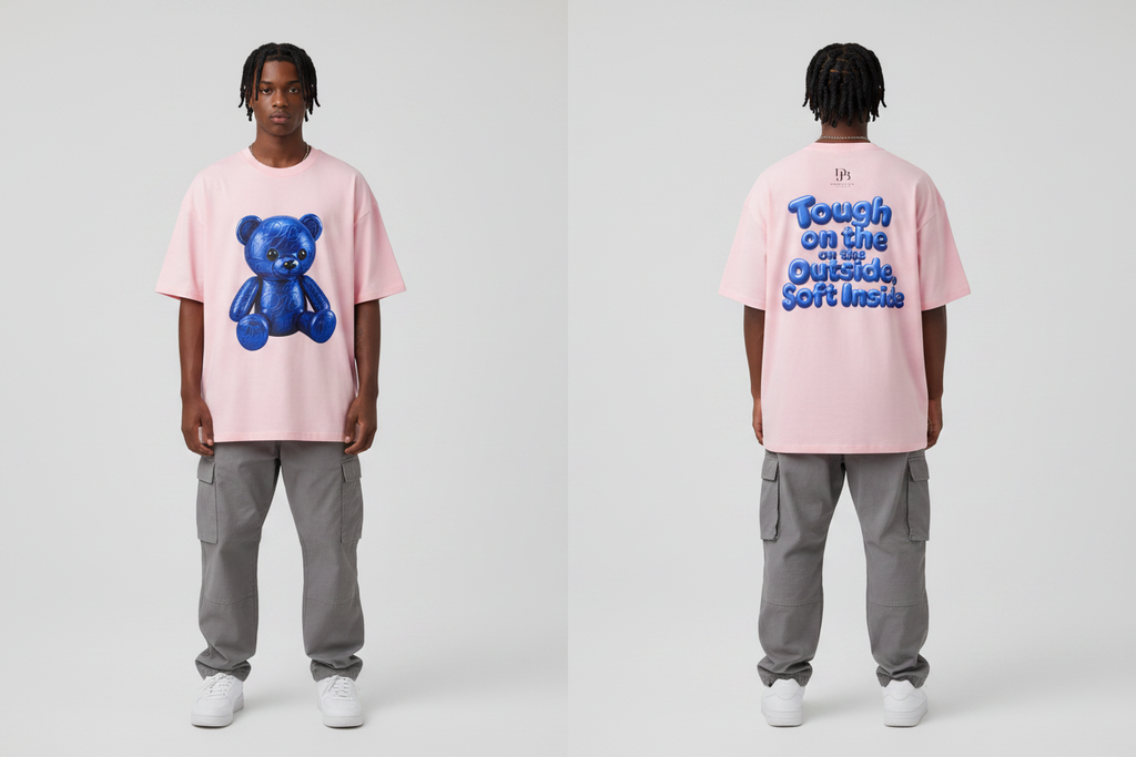 Male model wearing the DJB TEDDY Unisex Oversized Drop Shoulder T-Shirt, showing the front and back print