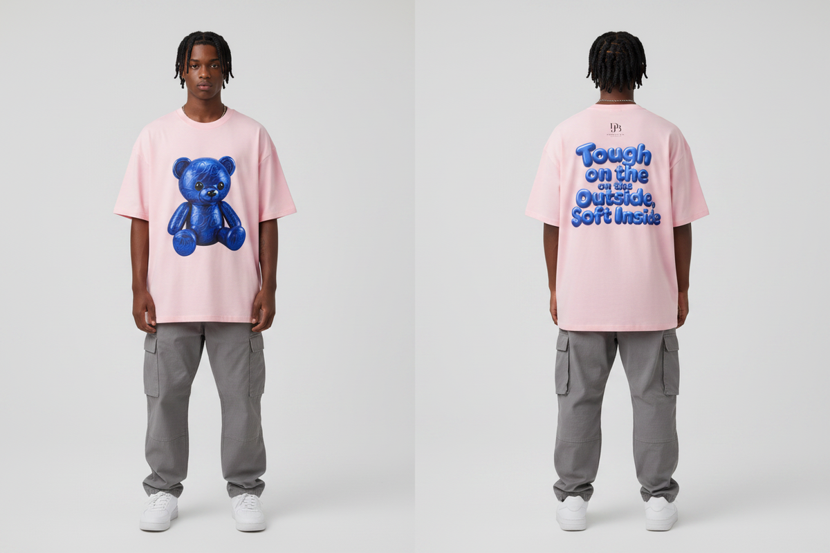 Male model wearing the DJB TEDDY Unisex Oversized Drop Shoulder T-Shirt, showing the front and back print