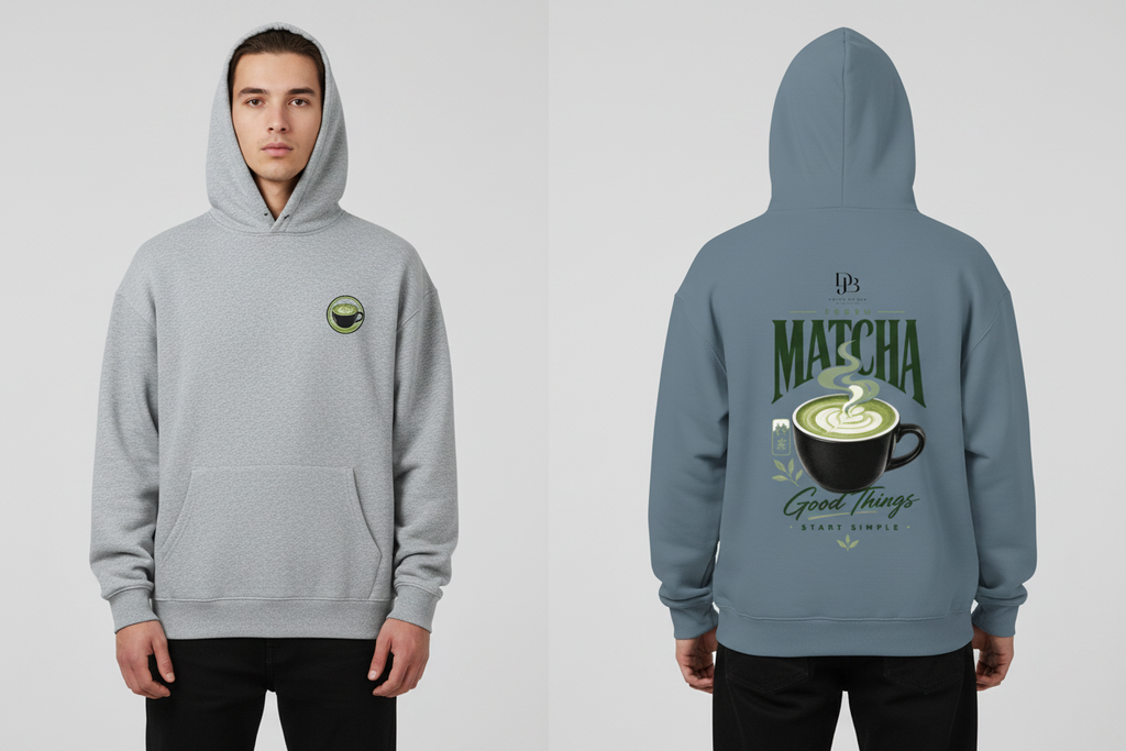 Model wearing the MATCHA heavyweight pullover hoodie, showing the front chest matcha cup graphic and the full MATCHA Good Things Start Simple back print.