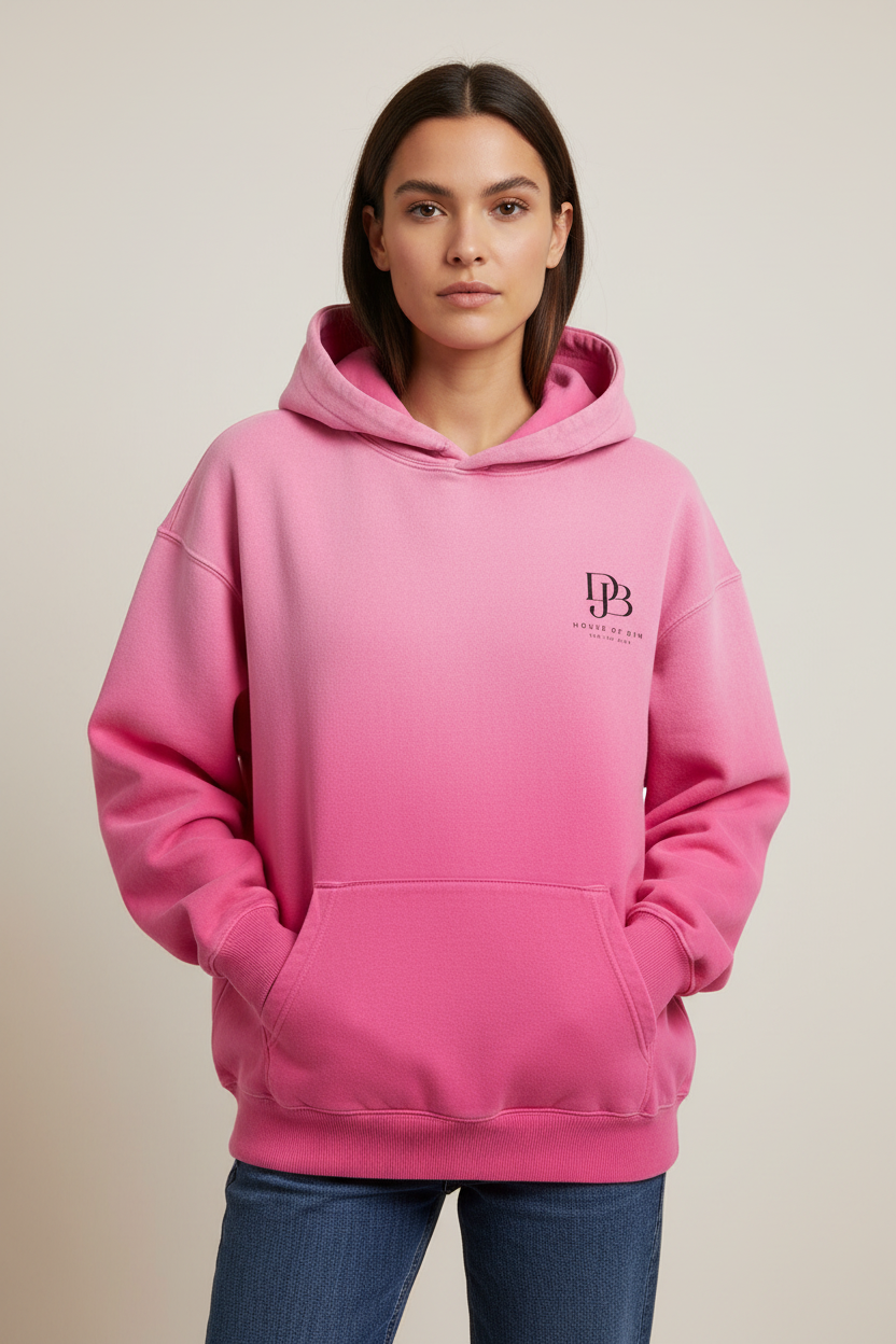 Female model wearing the pink No Room Sunfade Oversized Hoodie, front view