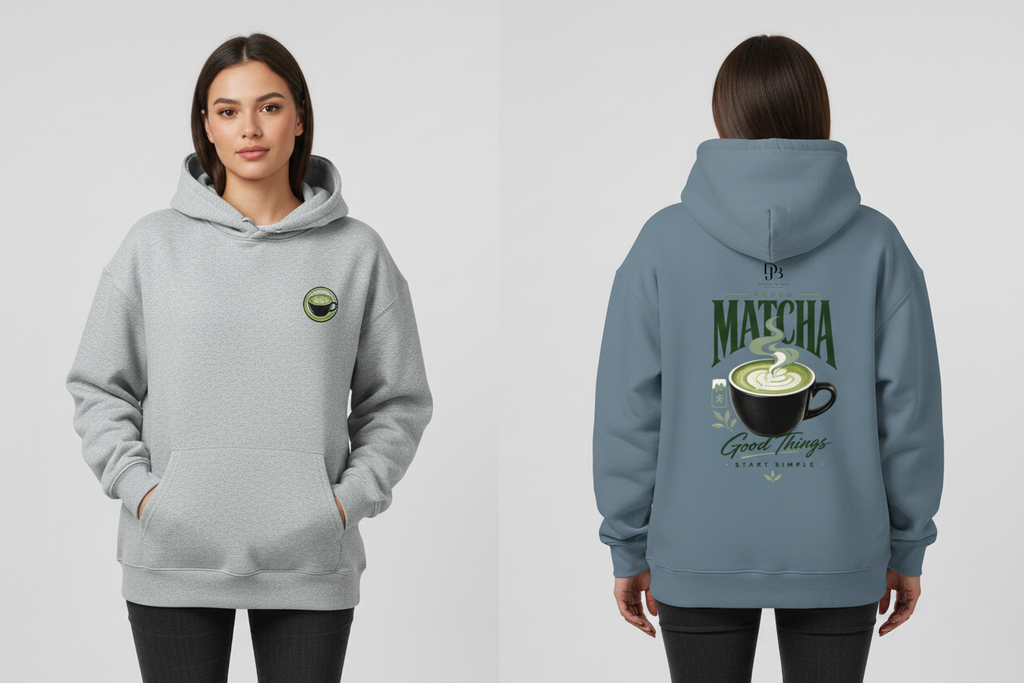 Woman wearing the MATCHA heavyweight pullover hoodie, showing the front matcha cup graphic and the full MATCHA Good Things Start Simple back print.