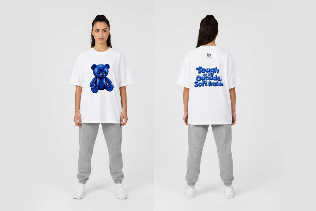 Female model wearing the DJB TEDDY Unisex Oversized Drop Shoulder T-Shirt, showing the front and back print