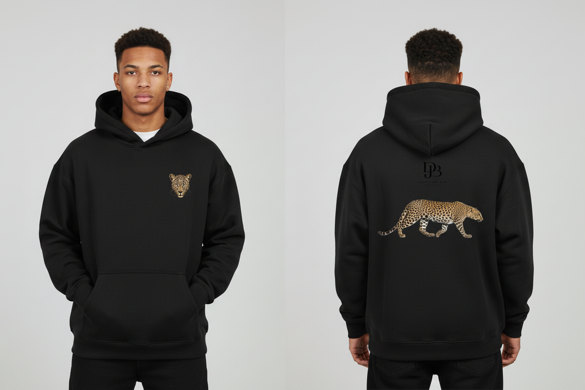Male model wearing the Cheetah DJB Oversize Fleeced Hoodie, showing the front and back print