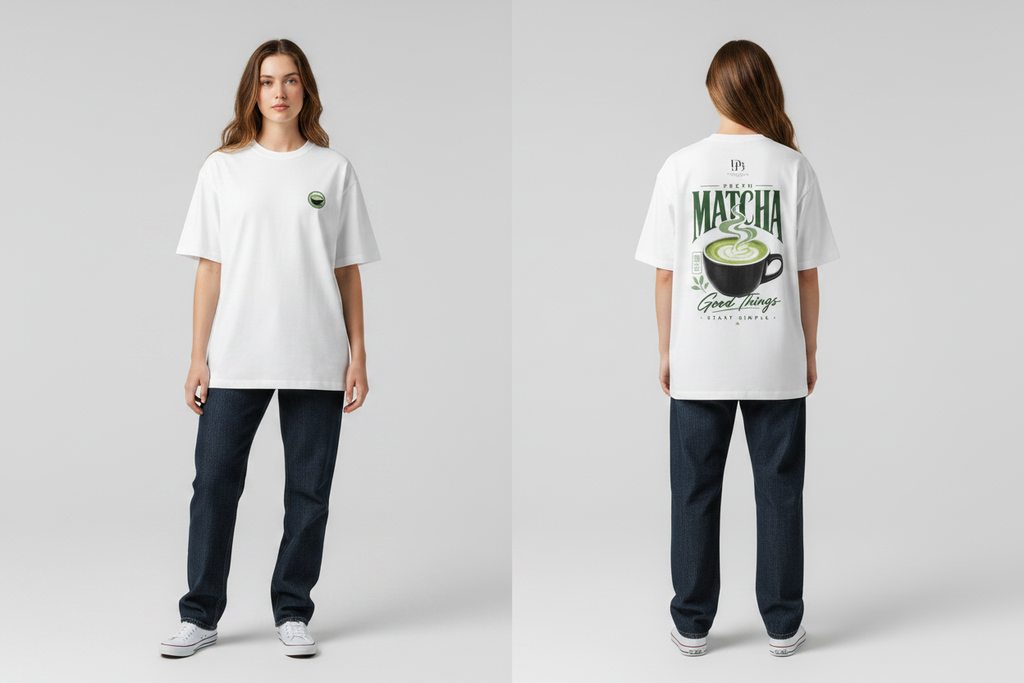 Female model wearing the MATCHA Unisex Oversized T-Shirt, clearly showing the improved front and back print