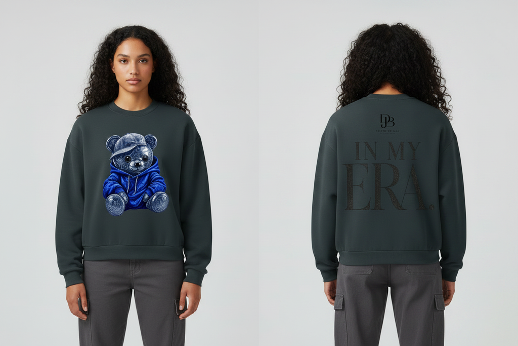 Female model wearing the WIP TEADY Boxy Fleece Crewneck Sweatshirt, showing the correct front and back print